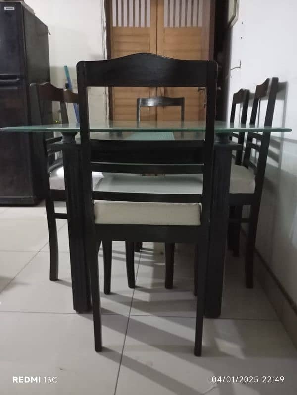 Glass top +bormateak Wood base Dining Table along with 6 wooden Chairs 6