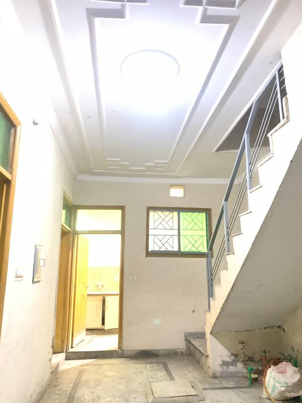 Double story house for rent in affshan colony Jonah line near range road 11