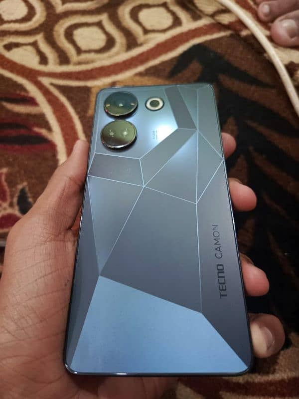 model camon 20, 0