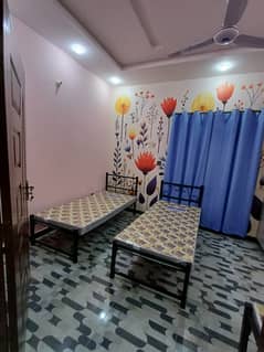 Brand new luxury Spanish Hania girls hostel Seats available in two and three seater Room for rent near ucp University or shaukat khanum hospital or UOL University or UMT University or Emporium Mall