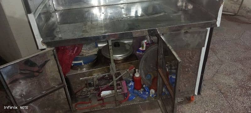 franch fries steel counter with all items urgent sell 4