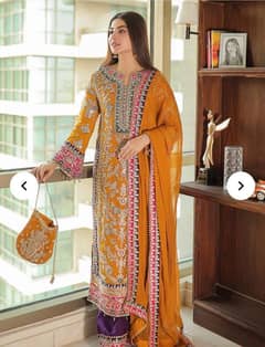 long shirt with hand embellished work , trouser + dupatta + potli