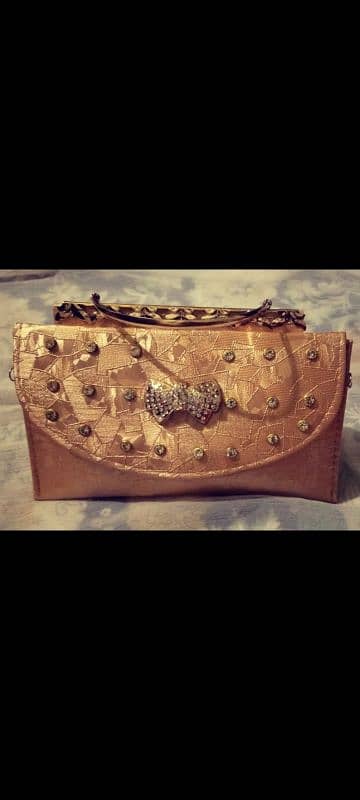 new light golden clutch. 0