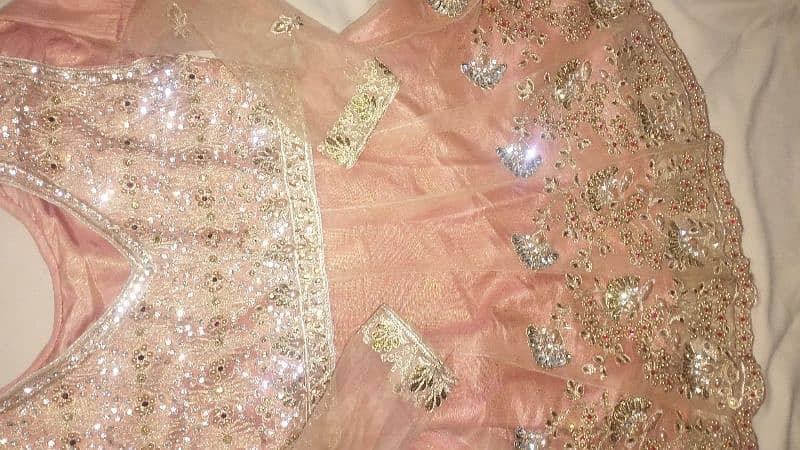 Beautiful Peach Colour Stitched Lahanga Dress 2025 7