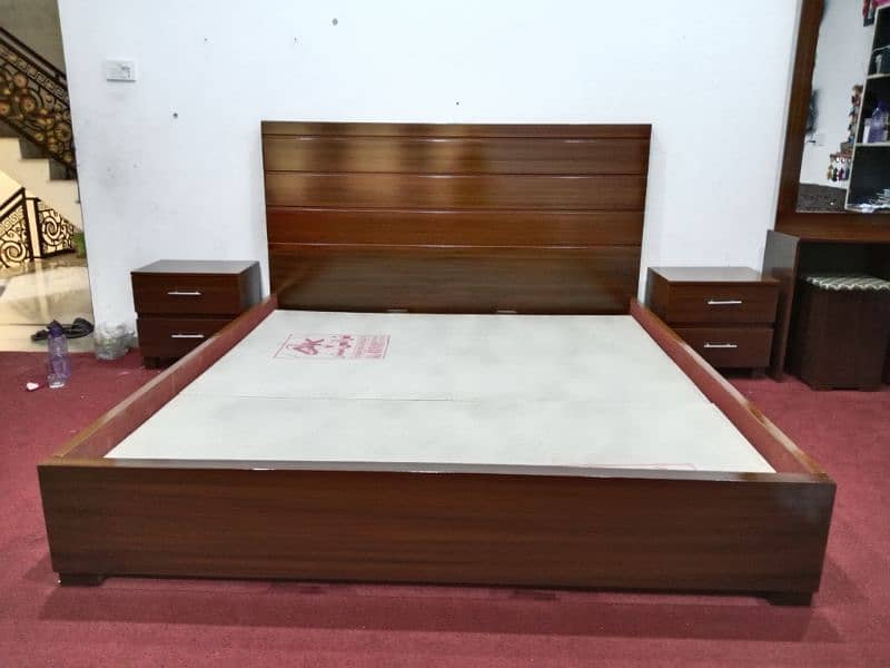 king size double bed with side table and glass Polish 1