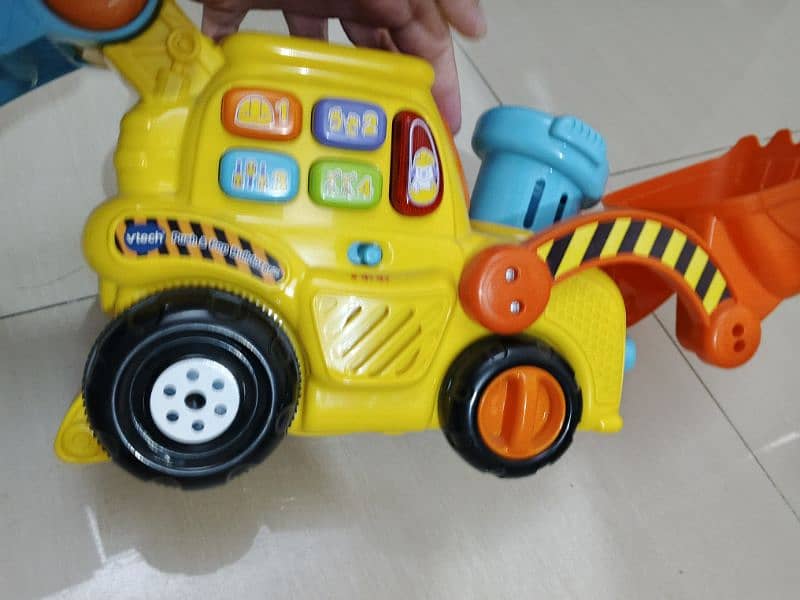 Vtech original Push and pump buldozer with lights music balls usa imp 4