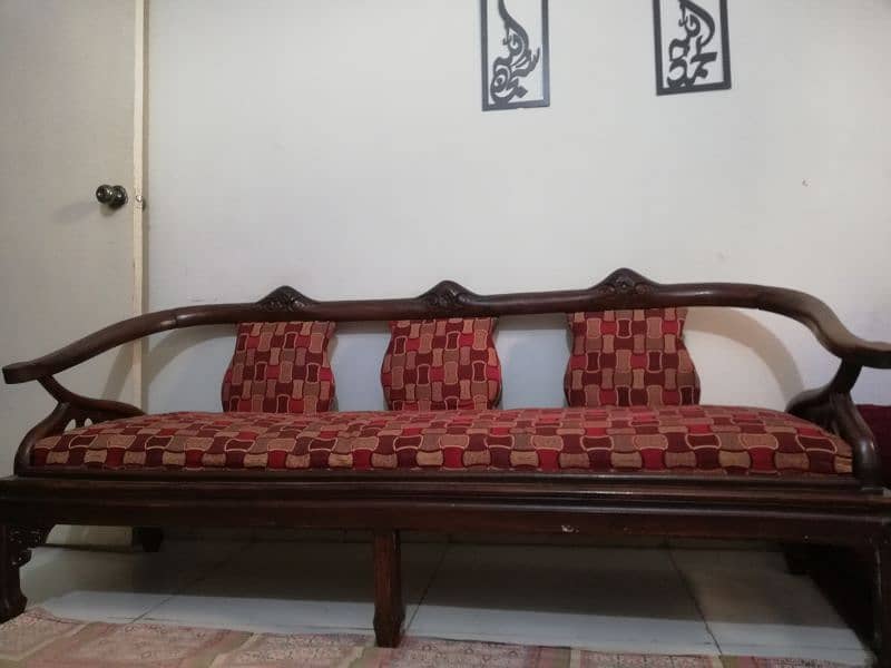 Its a pure wooden sofa set  in a very good condition 1