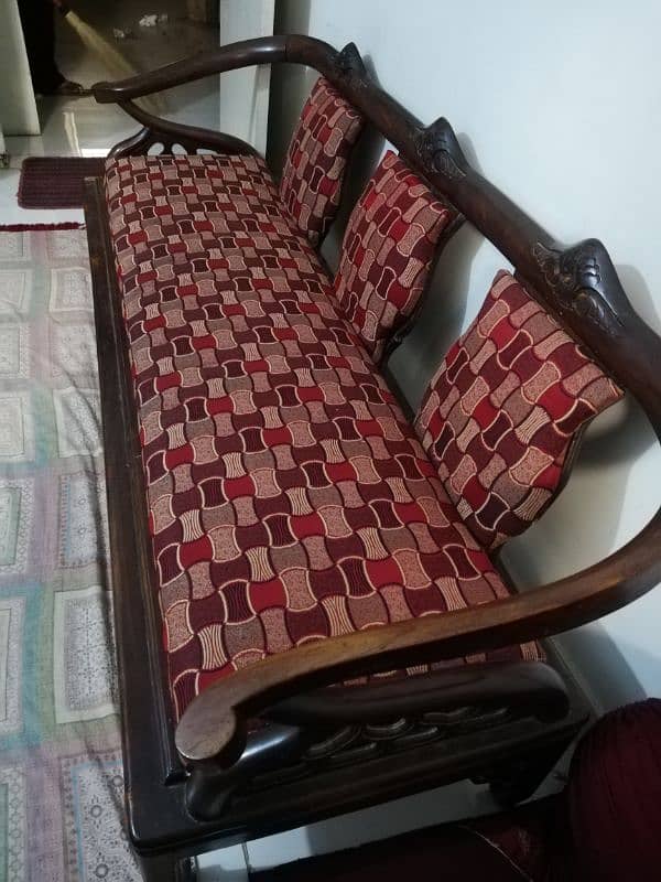 Its a pure wooden sofa set  in a very good condition 3