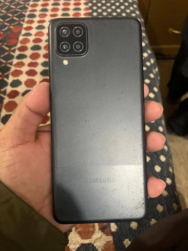 Samsung A12. condition 10by10. with original charger. without box 0