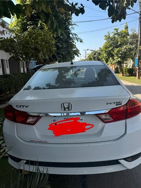 Honda City IVTEC taffeta white 2023 model reg nov 2023 1