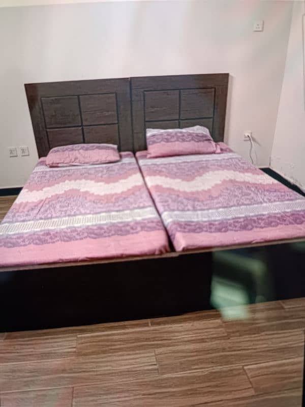 Two Single wooden Beds 2