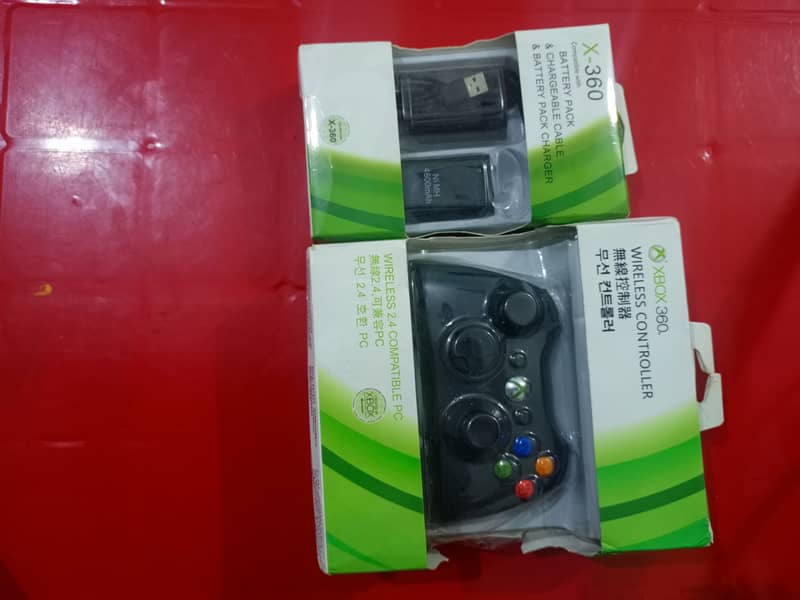 Xbox 360 slim 320 gb with 2 controller 1 wireless controller 2 battery 7