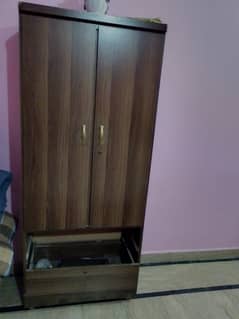 bed with cupboard