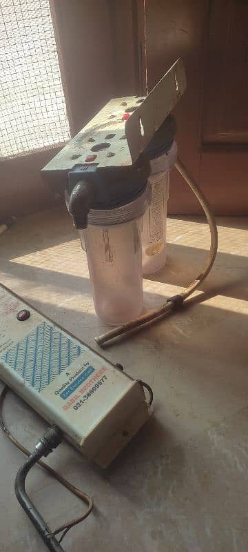 faulty water filter with bottles 2