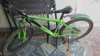 Green Lucky Bike a mountain bicycle with gears