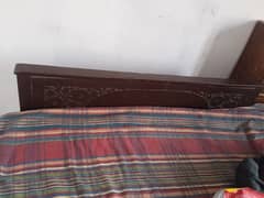 wooden single bed