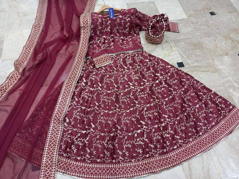 beautiful embroidered lehenga choli set 4 PCs in maroon can delivererd 1