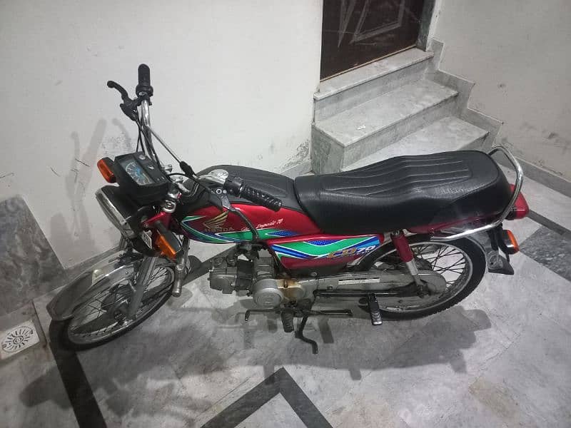 Honda CD 70 (2018 Model) Red Color Genuine spare part 1