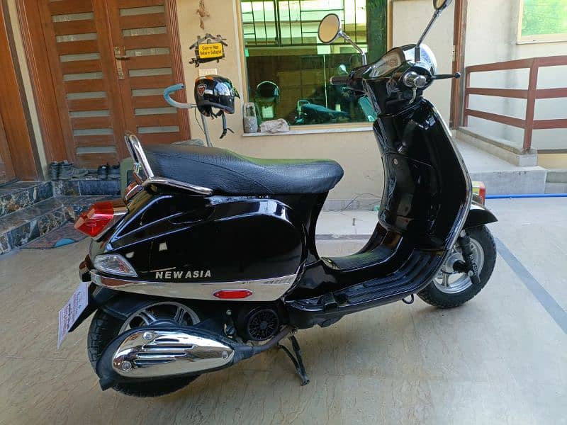 New Asia Ramza 100cc Petrol Black Islamabad Registered almost New 1