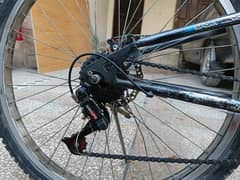 branded 21 gear cycle with dual shocks and dual disc brake