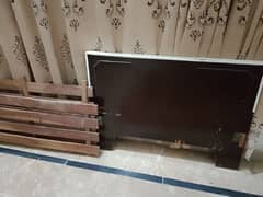 wooden single bed