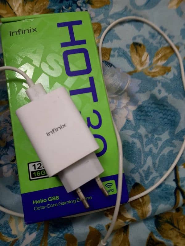 Infinix hot 30 box and charger 0