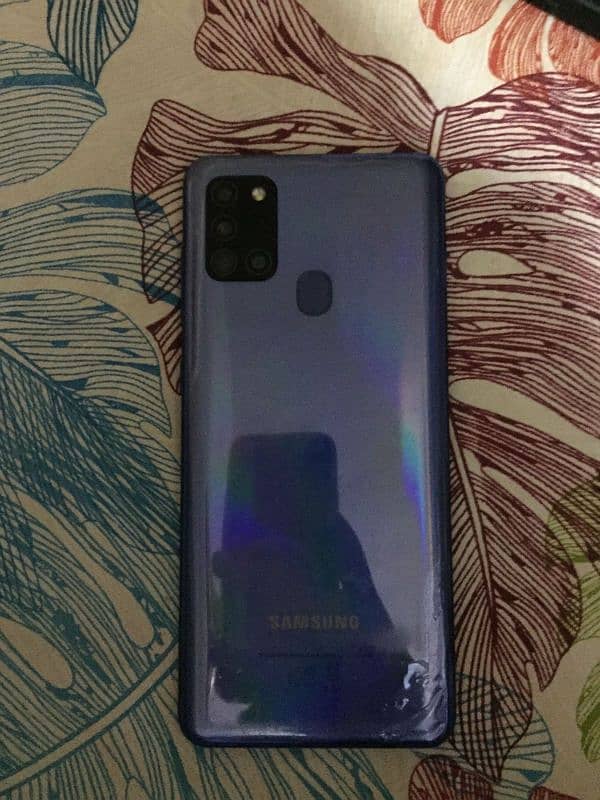 Samsung galaxy a21s bs back sa thora sa paper kharab ha bki all ok 0