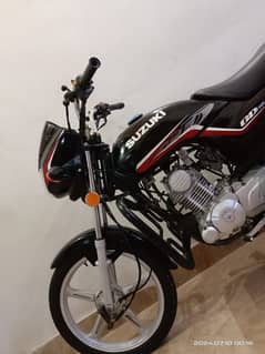 Suzuki 110 bike Karachi number new condition