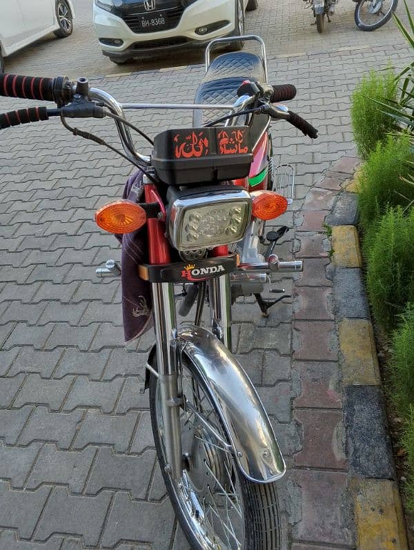 Honda 125 2014 model red genien 3