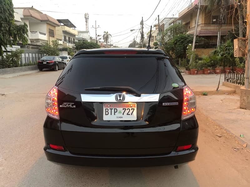 Honda Fit Shuttle Hybrid just like insight freed spike wingroad 8