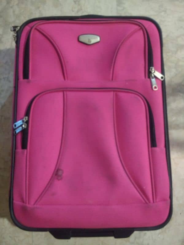 pink color small luggage bag with backpack 0