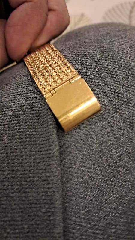 rado movado nivada golden watch with stones 4