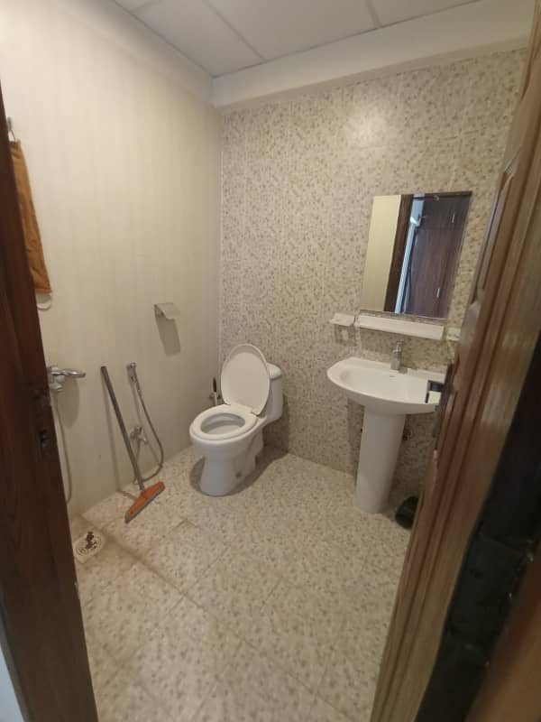 THREE BEDROOM FLAT FOR SALE ON INVESTOR RATE IN DHA PHASE 2 ISLAMABAD. 26