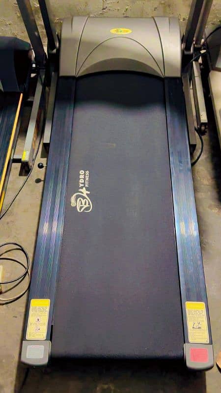 treadmil hydro fitness 130 kg weight sportted good runing condition 1