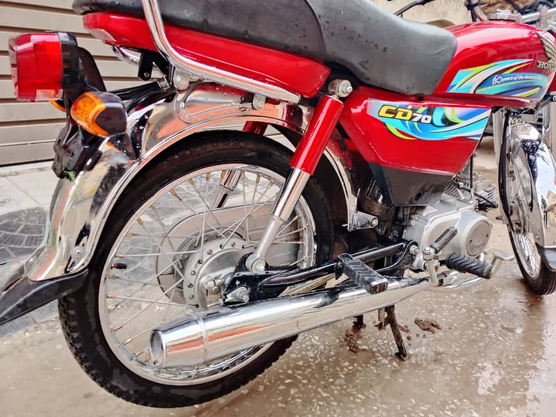 Honda CD 70 2024 5