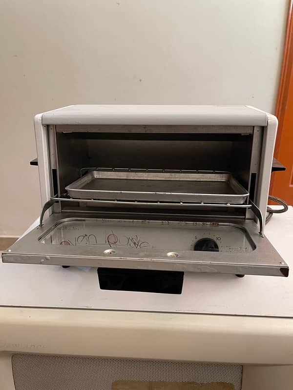 dawlance microwave and mini baking oven 3