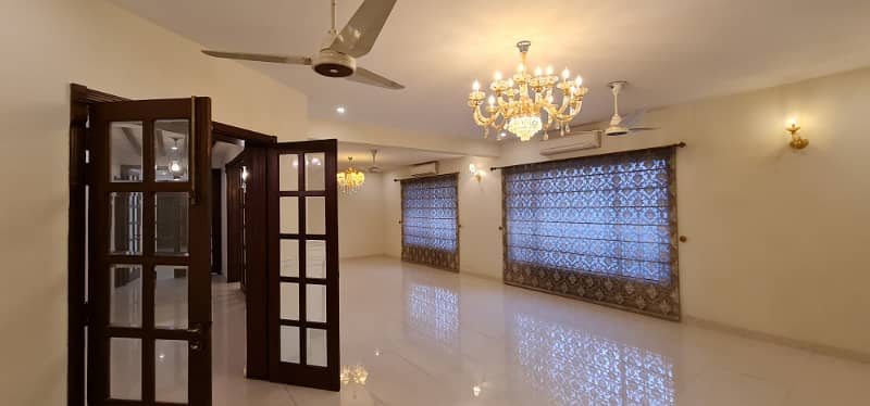 F-11/2: MARGALLA ROAD, 666 Yards MAGNIFICENT CORNER HOUSE, MODERN ARCHITECTURAL, TRIPLE STOREY, 9 Bedrooms, SUPERB/STRIKING LOCATION, Rent is Rs. 1200000/- Final, 1