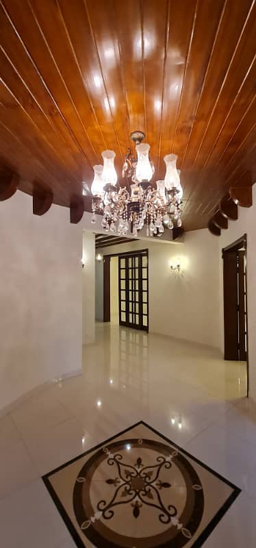 F-11/2: MARGALLA ROAD, 666 Yards MAGNIFICENT CORNER HOUSE, MODERN ARCHITECTURAL, TRIPLE STOREY, 9 Bedrooms, SUPERB/STRIKING LOCATION, Rent is Rs. 1200000/- Final, 3