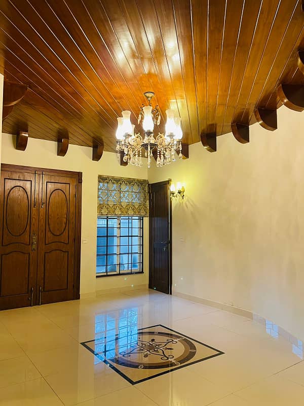 F-11/2: MARGALLA ROAD, 666 Yards MAGNIFICENT CORNER HOUSE, MODERN ARCHITECTURAL, TRIPLE STOREY, 9 Bedrooms, SUPERB/STRIKING LOCATION, Rent is Rs. 1200000/- Final, 9