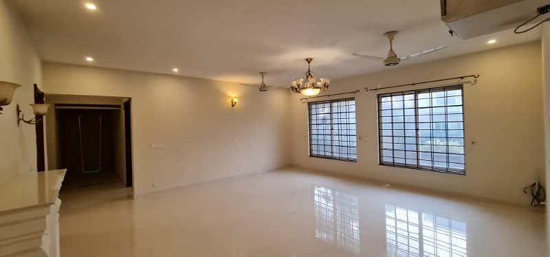 F-11/2: MARGALLA ROAD, 666 Yards MAGNIFICENT CORNER HOUSE, MODERN ARCHITECTURAL, TRIPLE STOREY, 9 Bedrooms, SUPERB/STRIKING LOCATION, Rent is Rs. 1200000/- Final, 13