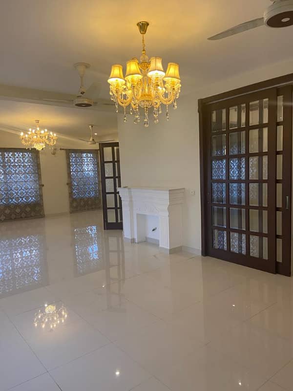 F-11/2: MARGALLA ROAD, 666 Yards MAGNIFICENT CORNER HOUSE, MODERN ARCHITECTURAL, TRIPLE STOREY, 9 Bedrooms, SUPERB/STRIKING LOCATION, Rent is Rs. 1200000/- Final, 17