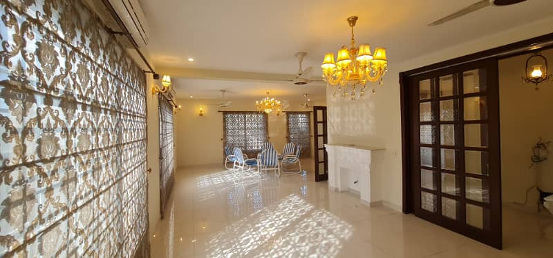 F-11/2: MARGALLA ROAD, 666 Yards MAGNIFICENT CORNER HOUSE, MODERN ARCHITECTURAL, TRIPLE STOREY, 9 Bedrooms, SUPERB/STRIKING LOCATION, Rent is Rs. 1200000/- Final, 47