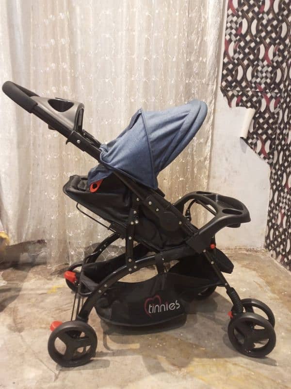 Tinnies stroller acid blue & black color C18 2