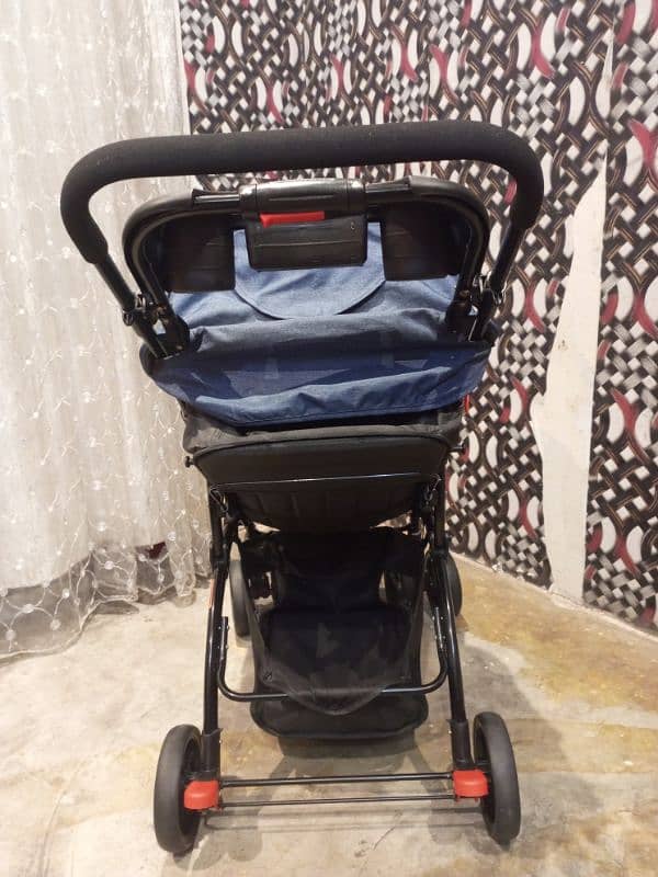 Tinnies stroller acid blue & black color C18 3