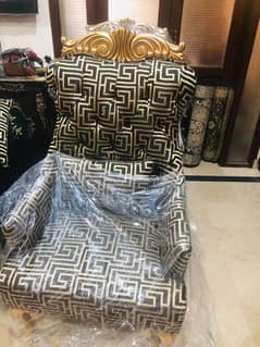 2 brand new black golden (Versace design )chairs