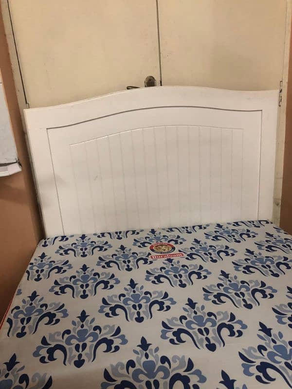 Single Wooden bed with side table available for sale 0