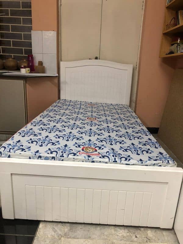 Single Wooden bed with side table available for sale 1