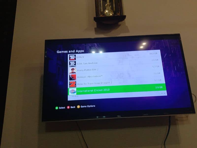 XBOX 360 in very good condition with 40 games installed GTAG addition 11