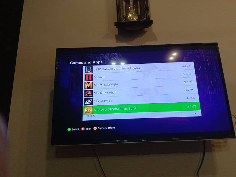 XBOX 360 in very good condition with 40 games installed GTAG addition 12