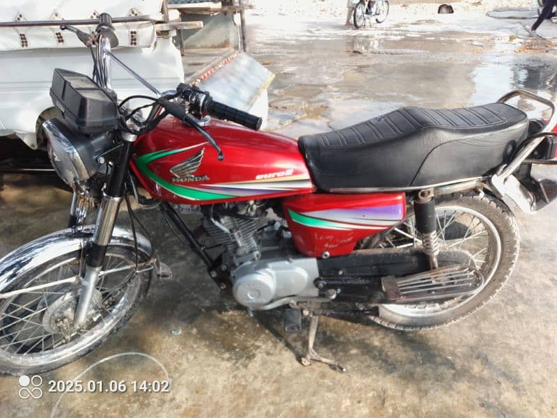 Honda 125 model 2013 islamabd number 6